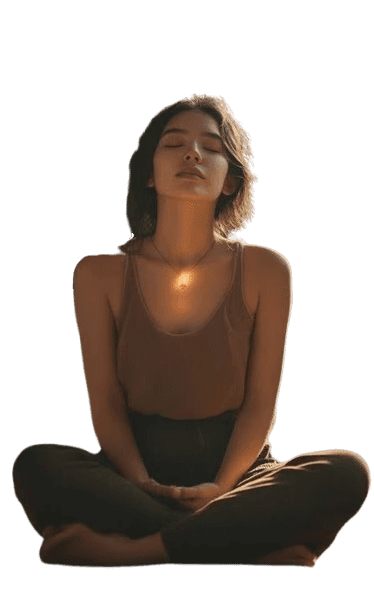 A woman sits cross-legged with eyes closed, wearing a white blouse and a long purple skirt, looking serene.